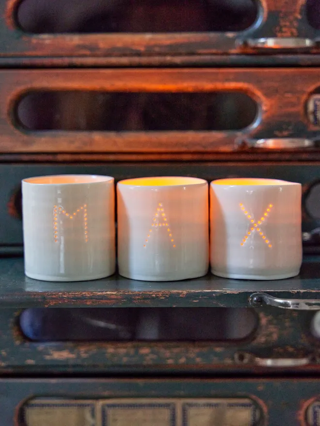 Max initial tea lights