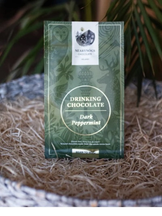 Drinking Chocolate 60% (Pack Of 200g/ 1kg), a packet of drinking chocolate sitting outside. 