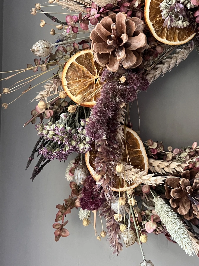 Cosy Winter wreath hanging on wall 