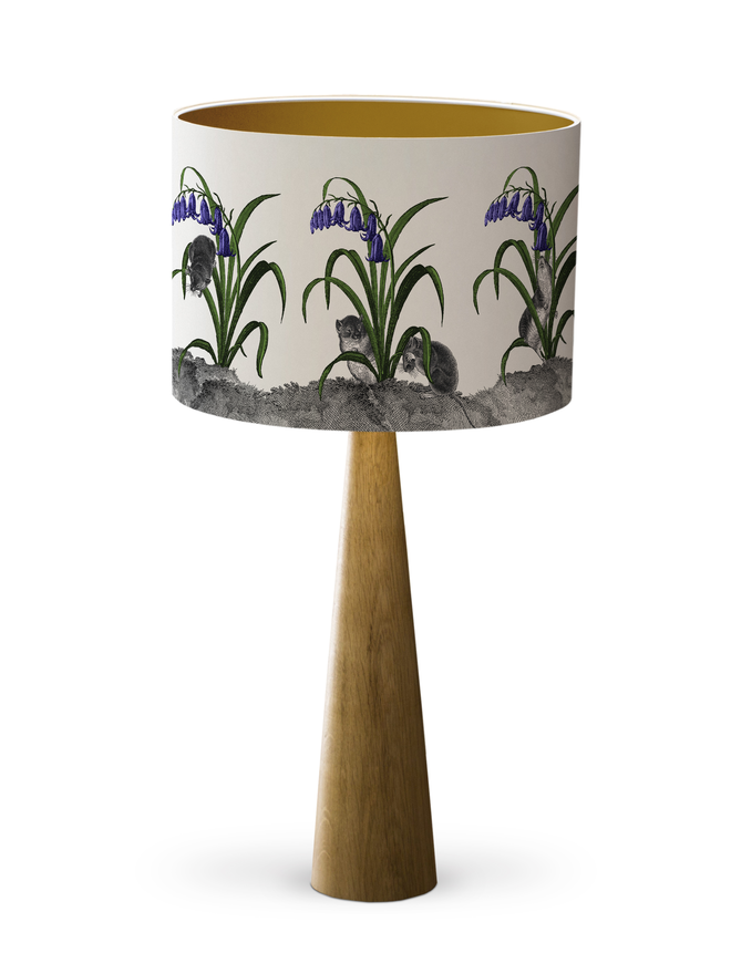 A whimsical lampshade featuring adorable mice hiding among bluebells, creating a charming woodland-inspired design.