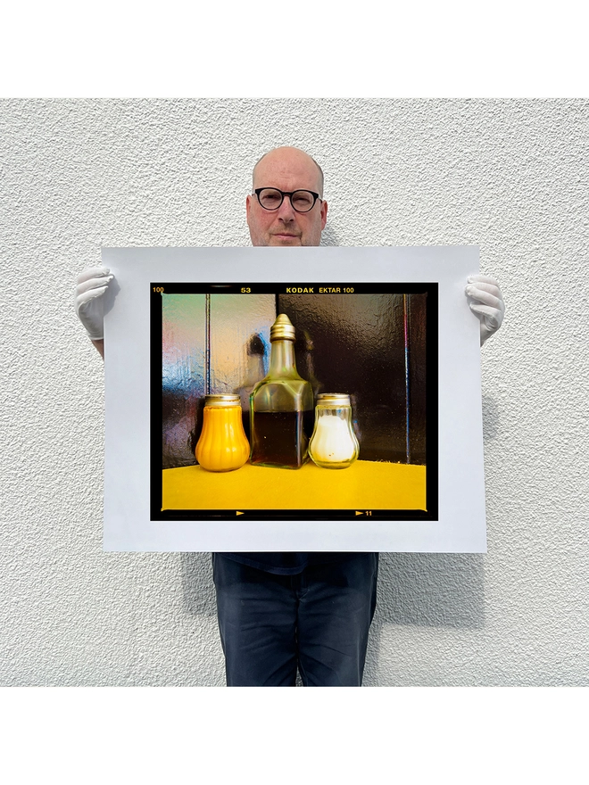 Richard Heeps holding Pepper, Vinegar and Salt photography print