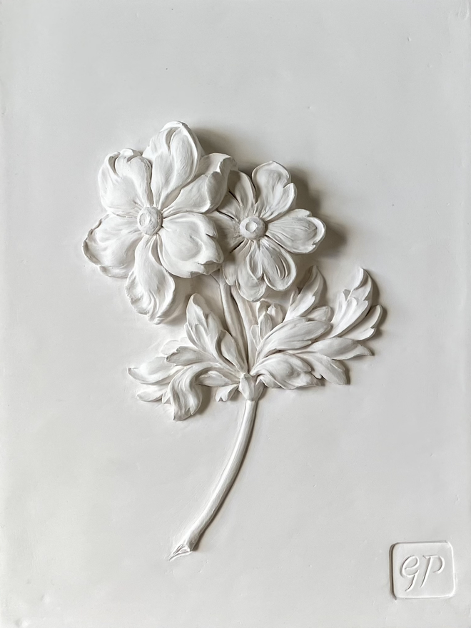 Detail of plaster of Paris bas-relief wall sculpture with Anemone flower design 