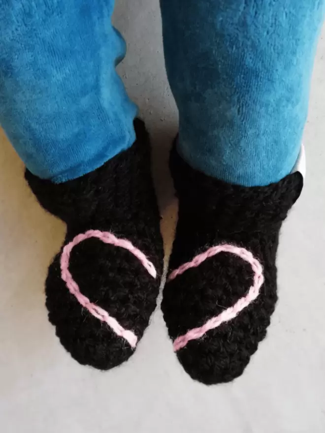 Baby booties with heart embroidery