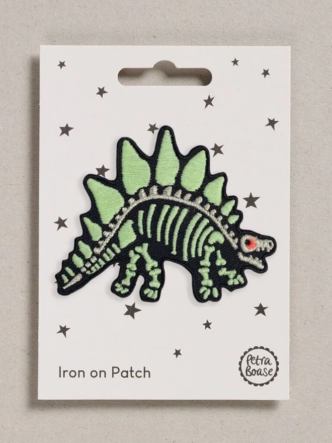 Glow in the dark  dinosaur iron on fabric patch.