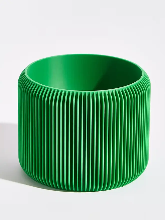 Sustainable 3D Printed Bamboo Green Plant Pot, turbin design against a white background.