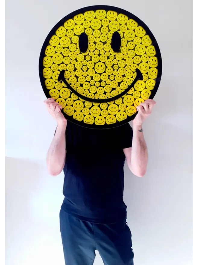 smiley face badge artwork