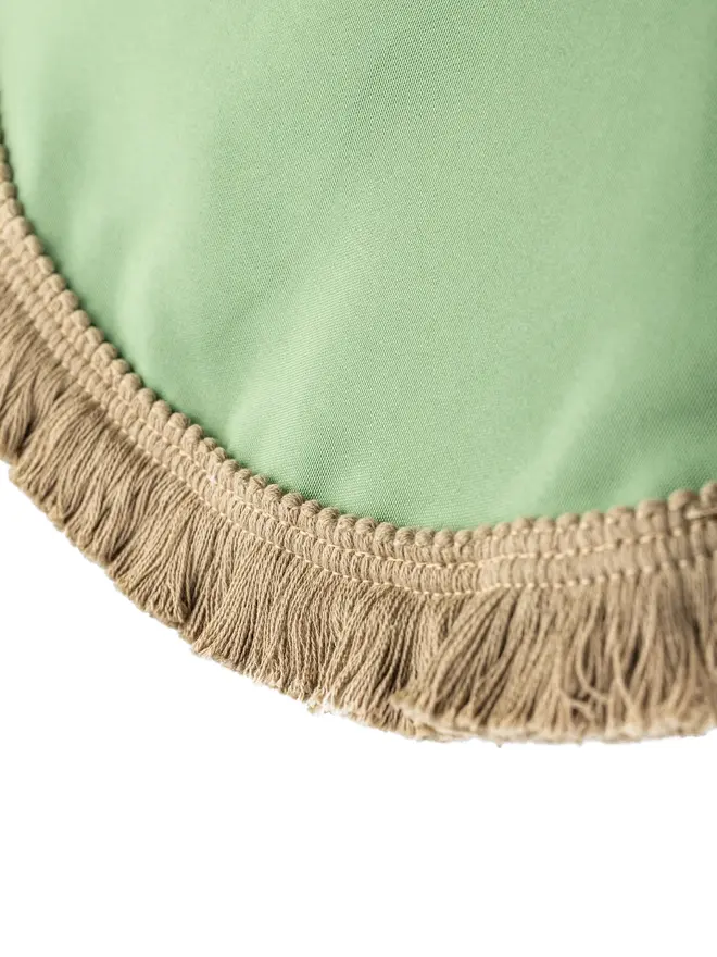 green parasol tassel edge