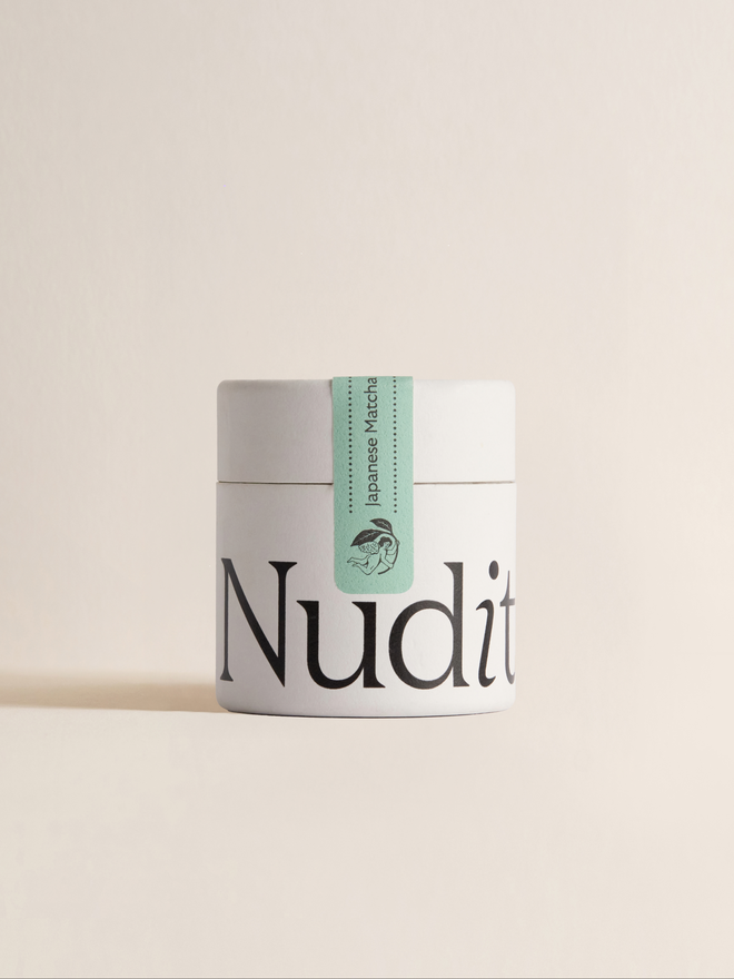 white pot of matcha with black text and light green label