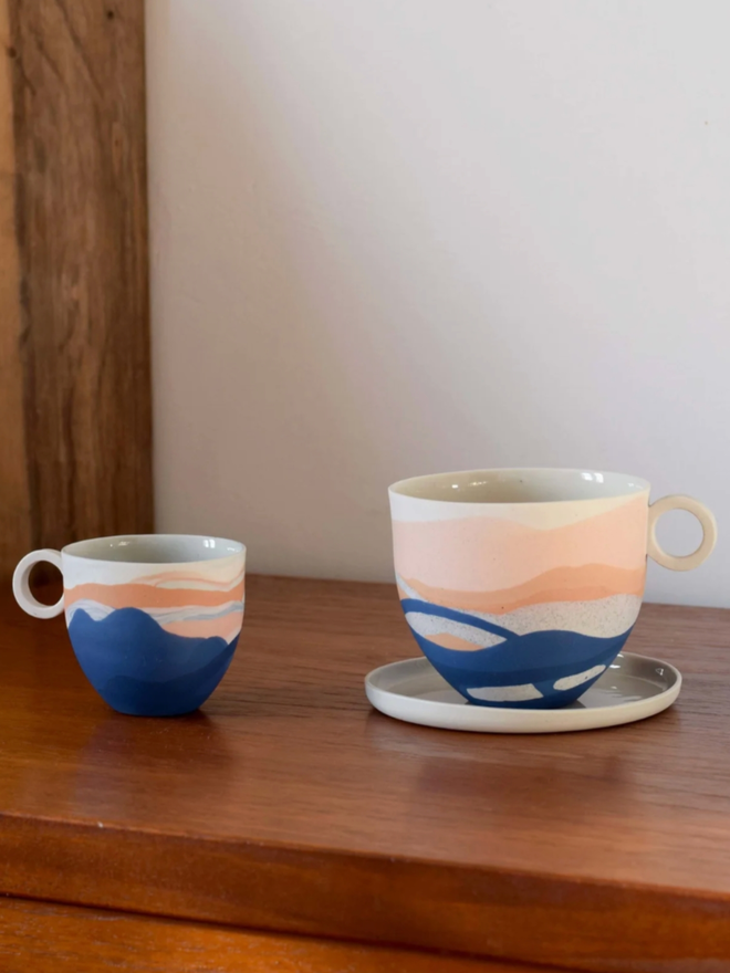 Shore Dreamlands Espresso Cup. A cup and a mug from the Shore Dreamlands collection.