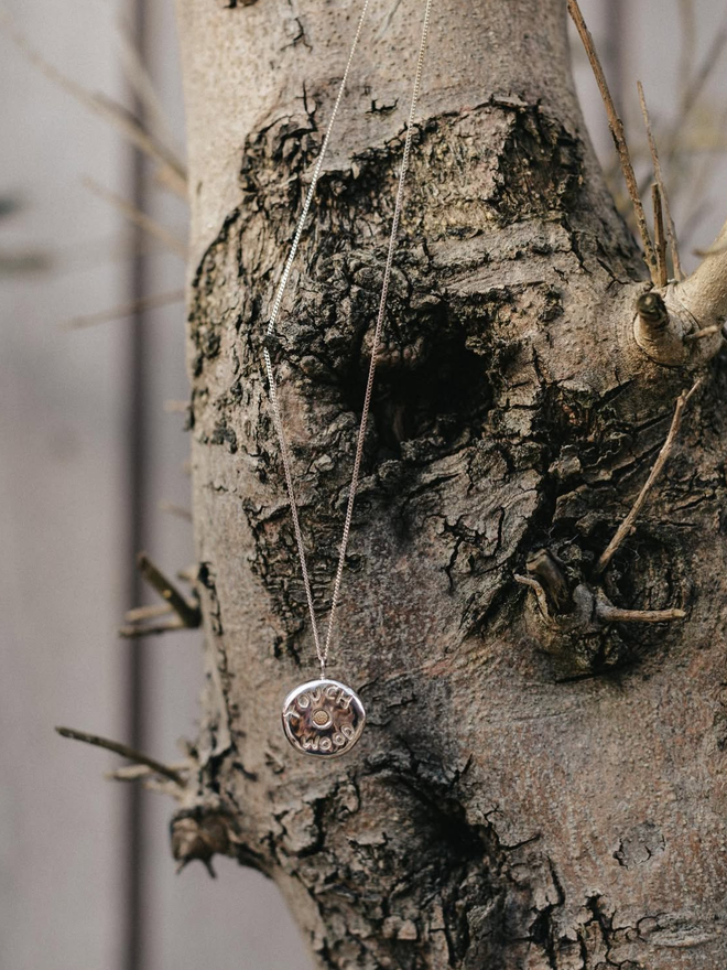 Touch wood necklace