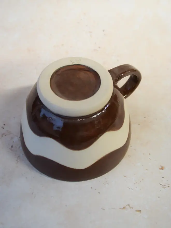 Handmade ceramic Ripple Mug — bottom view showing base and wavy pattern