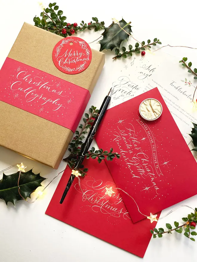 christmas modern calligraphy kit. contents of calligraphy kit shown with gift box.