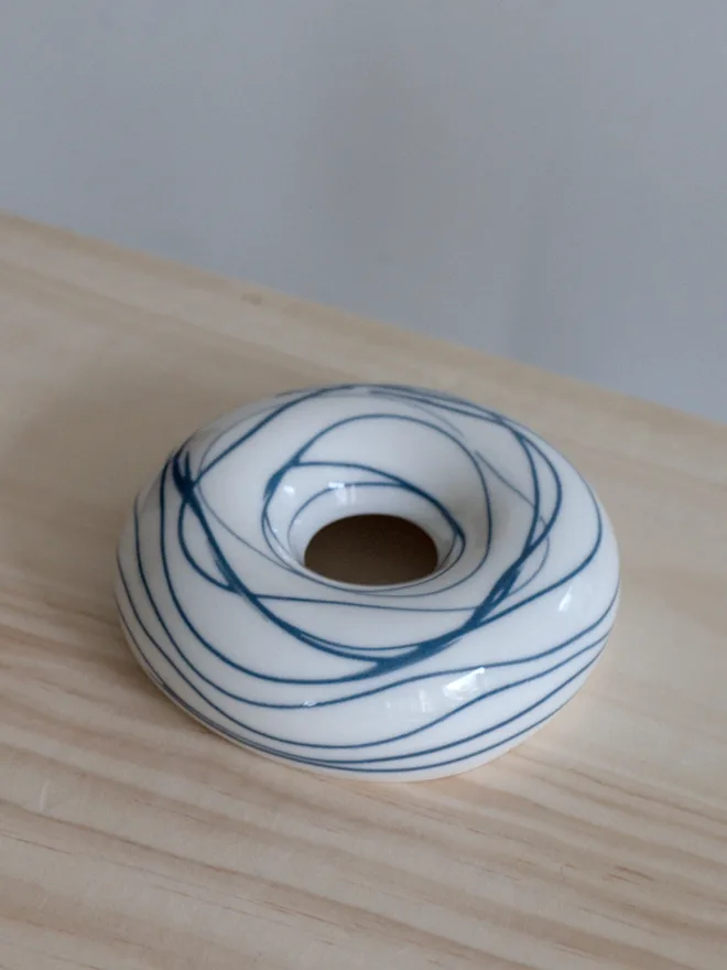 Avocado Planter White & Blue Handmade porcelain avocado planter with carved blue pattern, designed to hold an avocado seed for sprouting