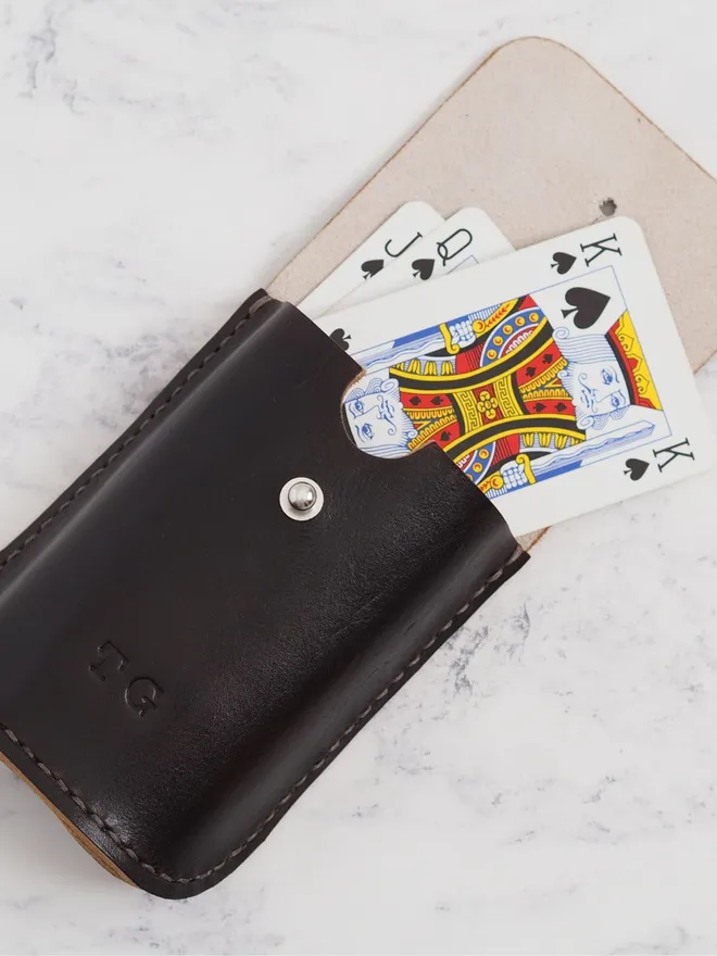 personalised leather playing card case in dark brown