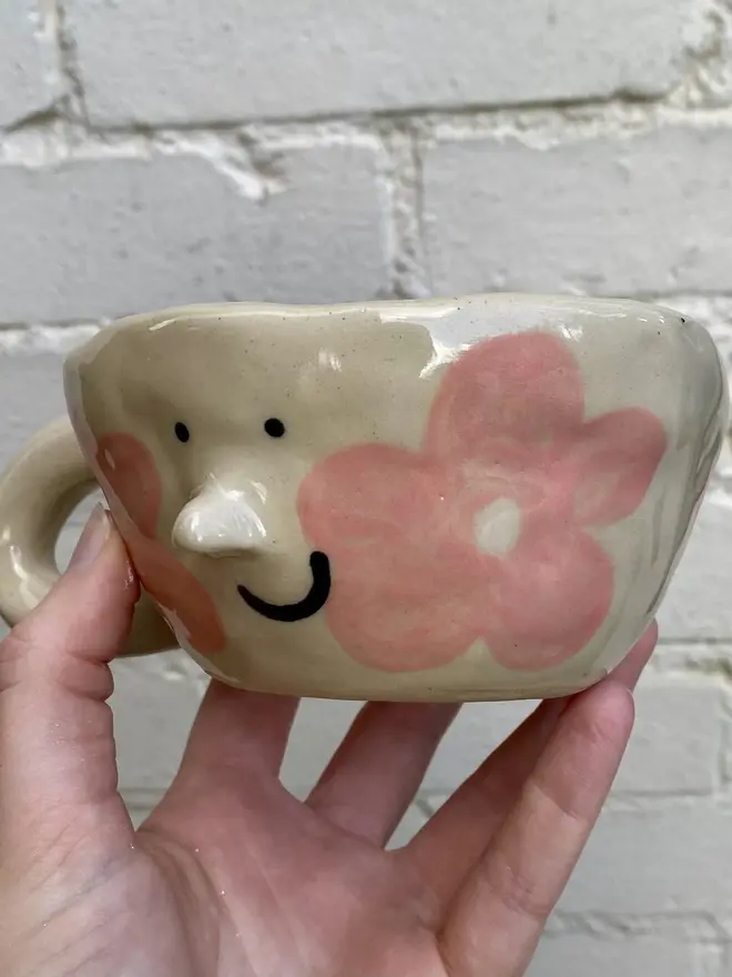 pink flower handmade ceramic smiley face mug