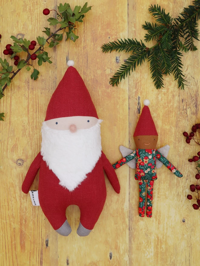 santa clause doll with white beard and small christmas fairy doll 