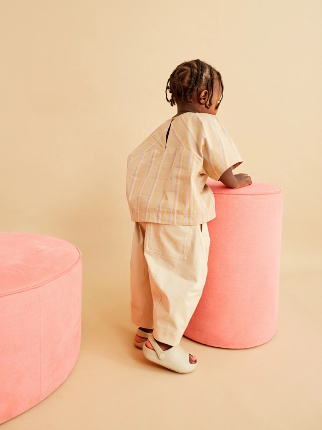 cool beige rounded barrell leg trousers by small cool uk brand studio koter. this kidswear shop is also stocked on ando and cissy wears and the style is similar to claude & co