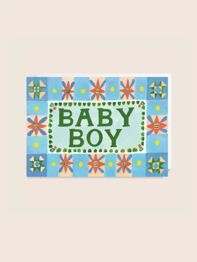 'Baby Boy' New Baby Card, against a pink background. 