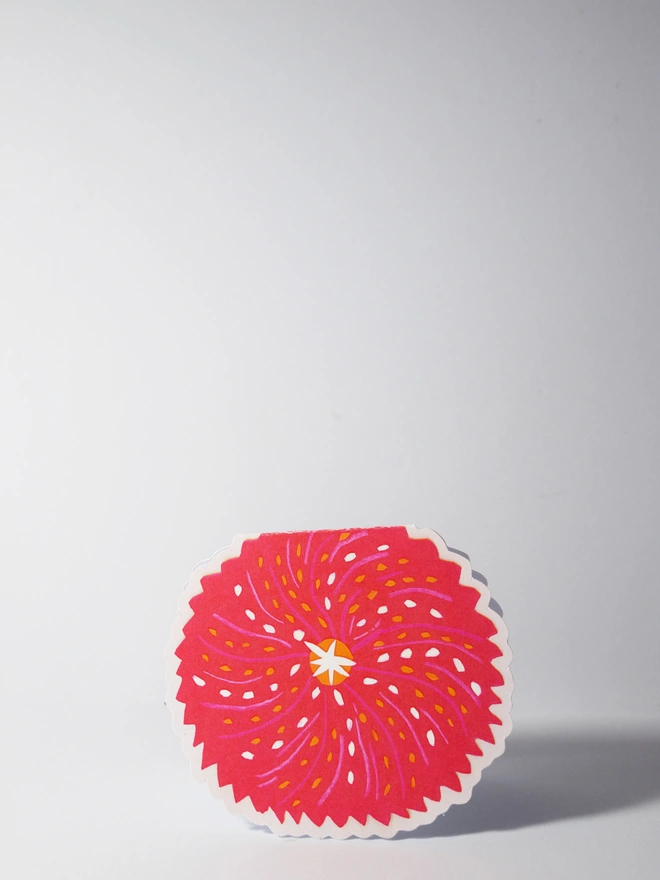 A cut out card of an urchin