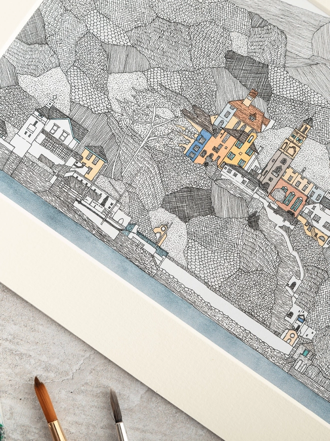 Print of detailed pen and watercolour drawing of Portmeirion and welsh hills, in a soft white mount