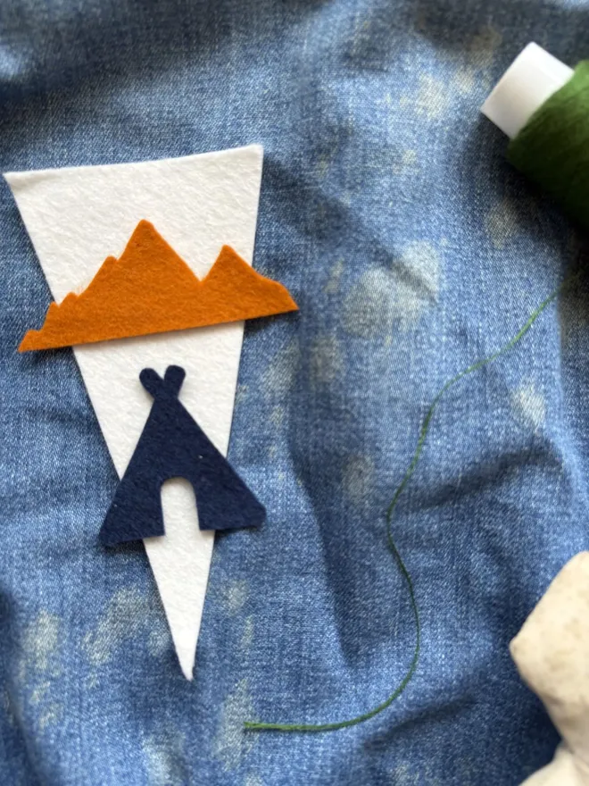 Felt shapes on a denim jacket