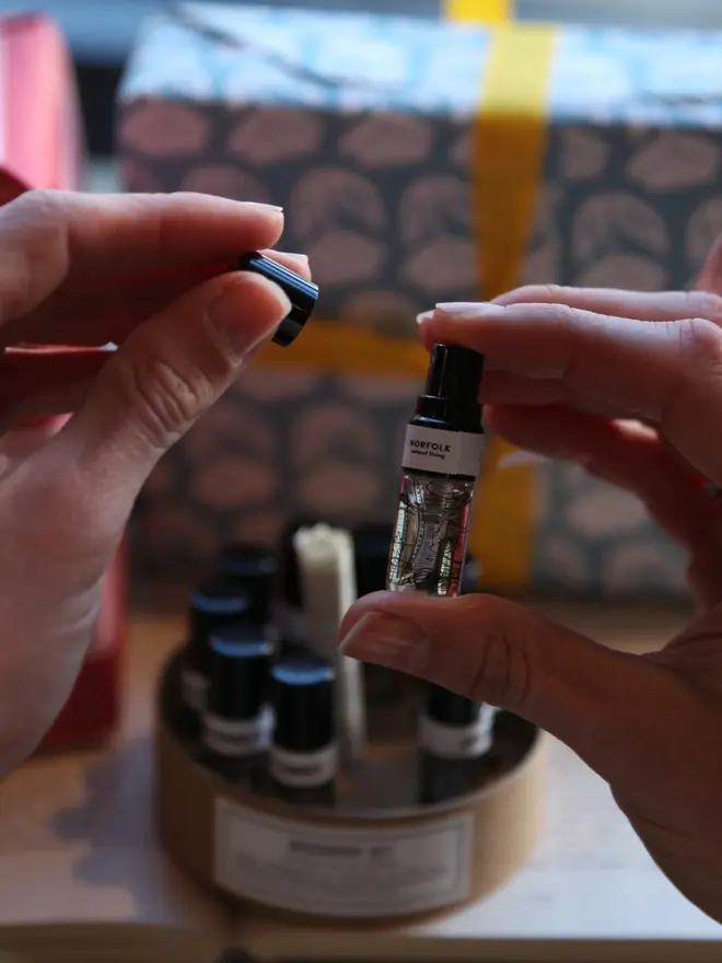 Set of 10 mini vials of perfume in a gift box