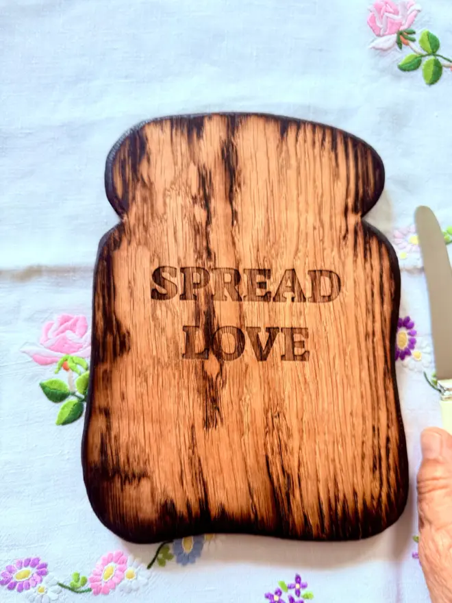 Small engraved with engraved spread love 
message and optional vintage butter knife.