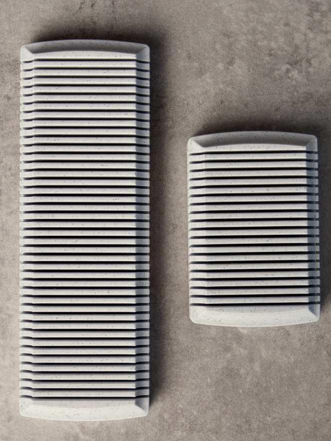 Calligraphy Card Drying Rack. A bird’s eye view of the drying rack with its smaller variant, showcasing their sections.