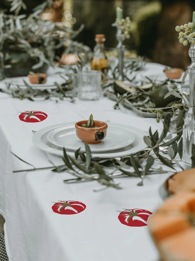 tomato tablecloth stickers on a white tablecloth