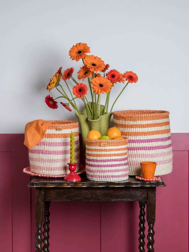 lifestyle set up of woven striped baskets