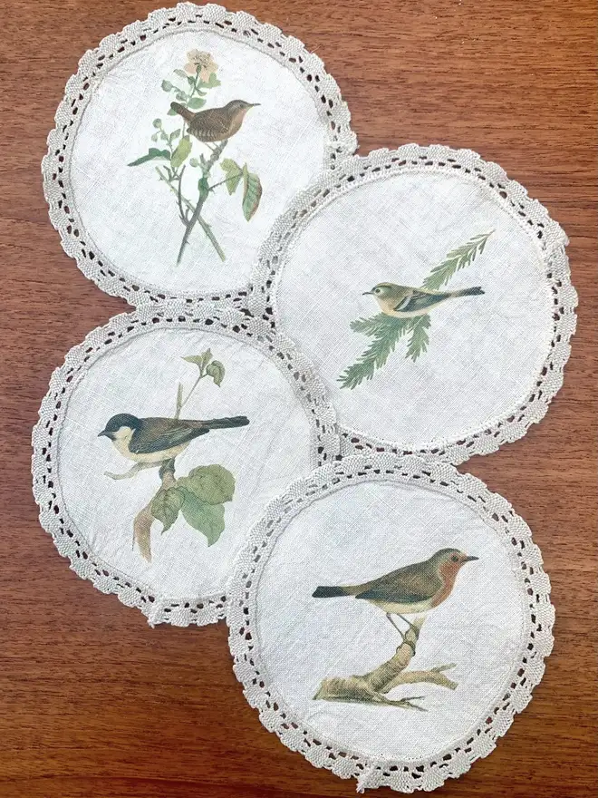 four vintage linen coasters with crochet edge and british garden birds