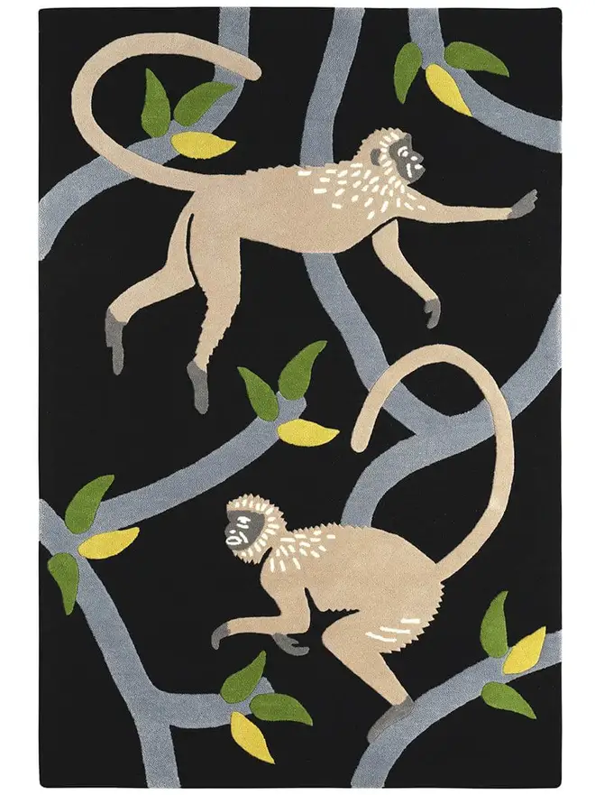 Langur Hand Tufted Rug, a monkey design rug sitting on a plain surface. 