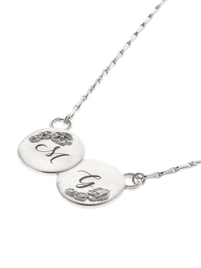engraved flower double coin silver