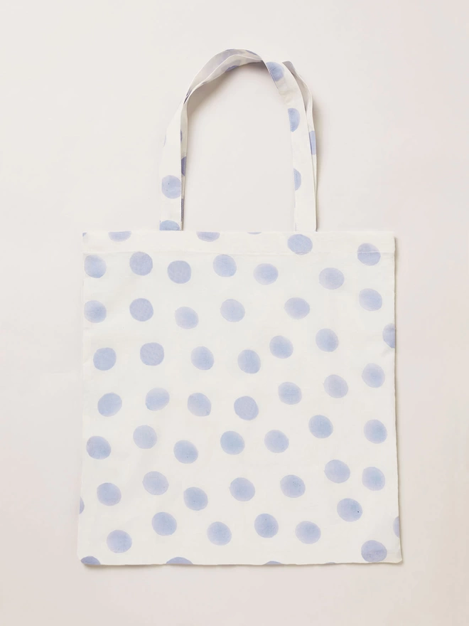 white and blue dot printed tote bag