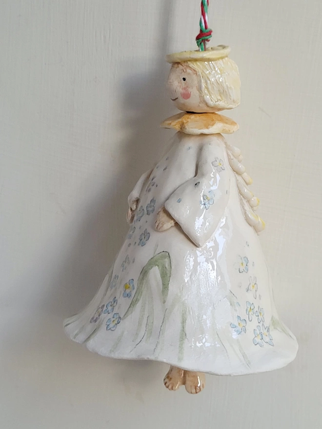 hanging christmas angel with tiny legs as the clanger hand sculpted wings and blonde hair