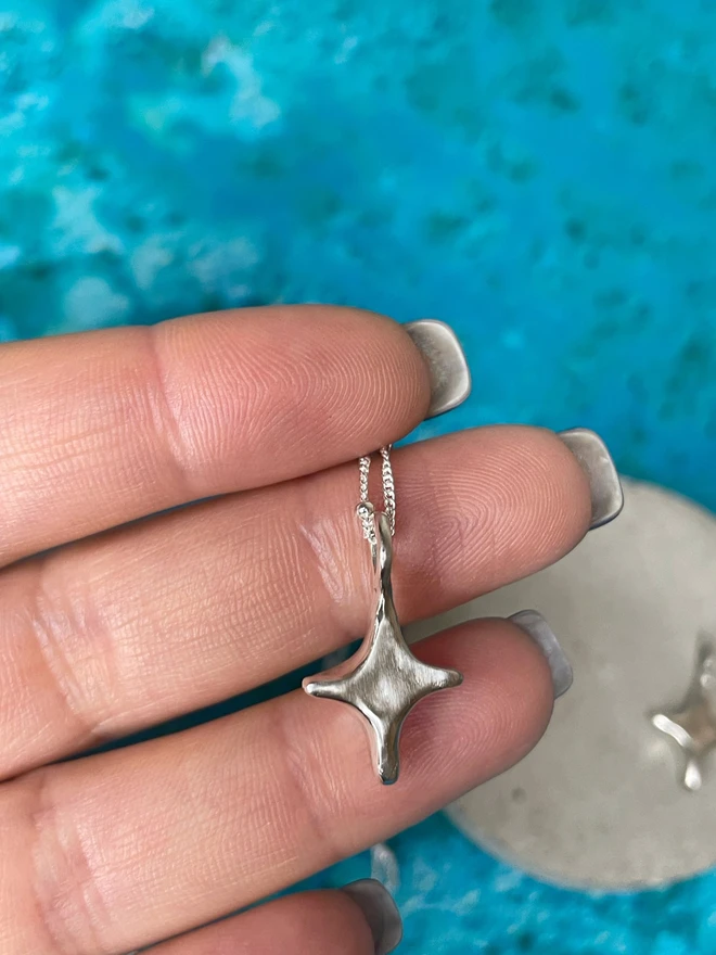 Hand made star charms made from 100% recycled sterling silver, cute gift for girlfriend or wife for Valentine's Day or Mother's Day. Add a personalised initial and send straight to your special someone. Made by Celina C Jewellery, a small business in the UK, find on Holly and Co.