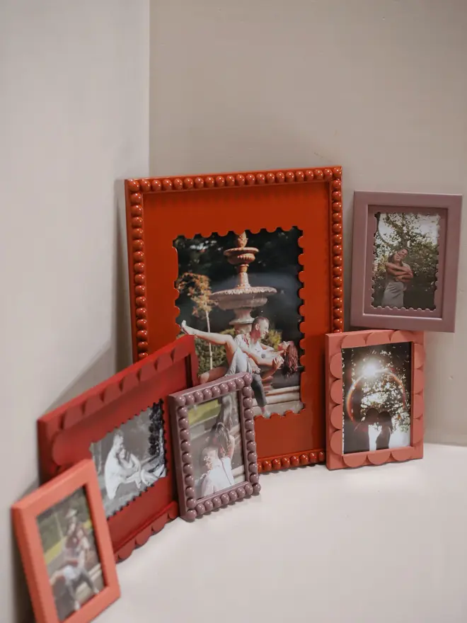 lobster orange coloured stamp shaped frame mount