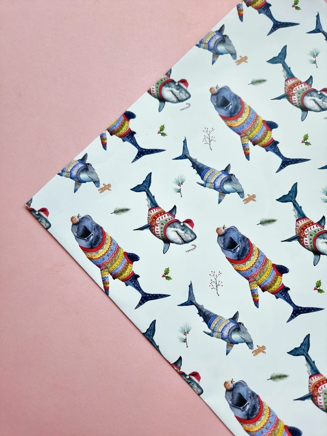 Christmas Sharks wearing sweaters wrapping paper close up