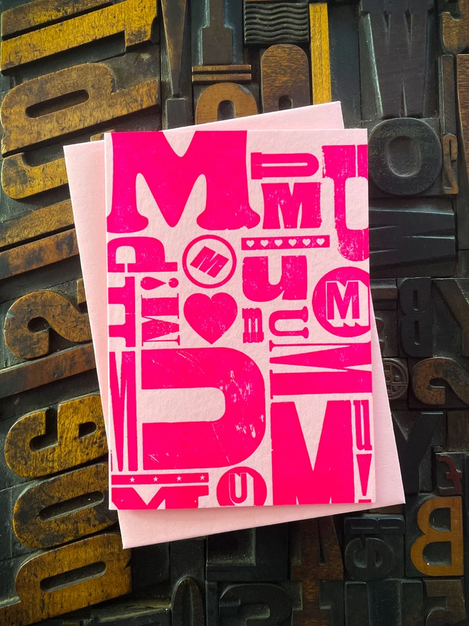A deep impression letterpress printed mother's day card. Fluorescent pink ink on traditional printed type blocks. Printed bt hand on my 1915 Arab Crown Folio Press. Comes with a range of matching coloured envelopes.