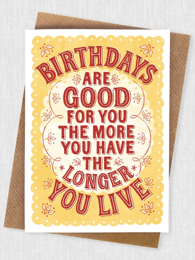 red and yellow birthdays are good for you card on kraft brown envelope