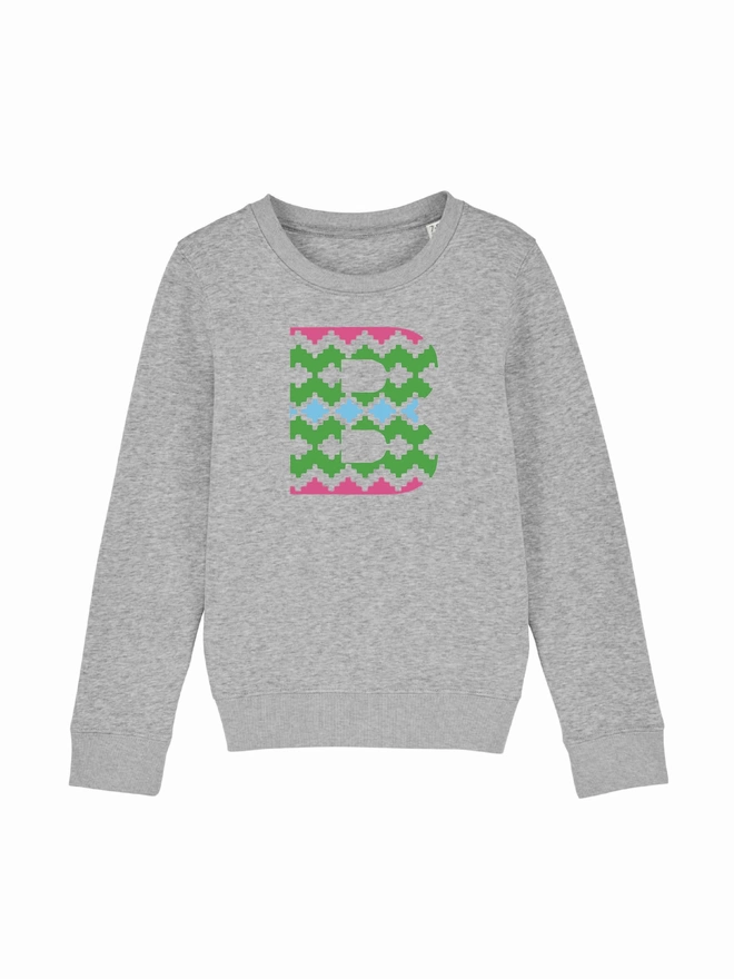 a grey 'Narrator' sweatshirt with the letter a on it, by The Faraway Gang.