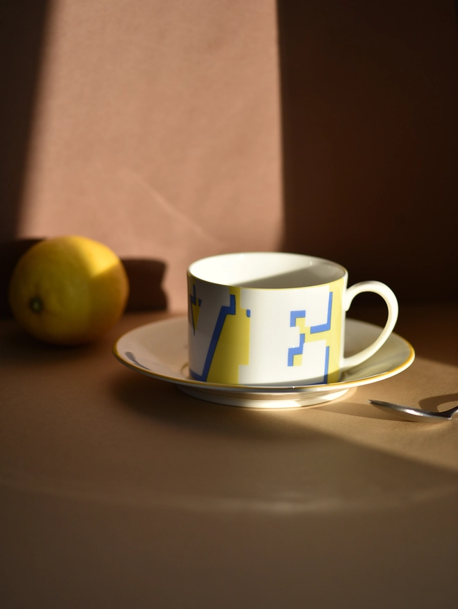 'Love' Cup & Saucer - Yellow