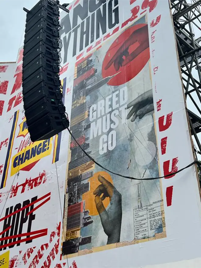 Checkmate artwork as a stage banner at Glastonbury 2023