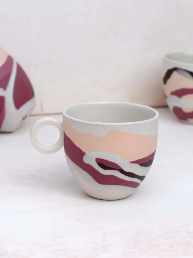 Dune Dreamlands Espresso Cup. A selection of cups from the Dune Dreamlands collection, showing typical variation in decoration.