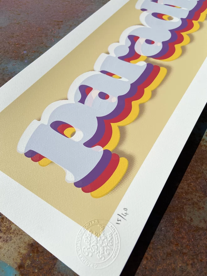  "Paradise" Cream Handpulled Screenprint rectangular with cream background and the word paradise printed on top in rainbow letters includes a drop shadow 