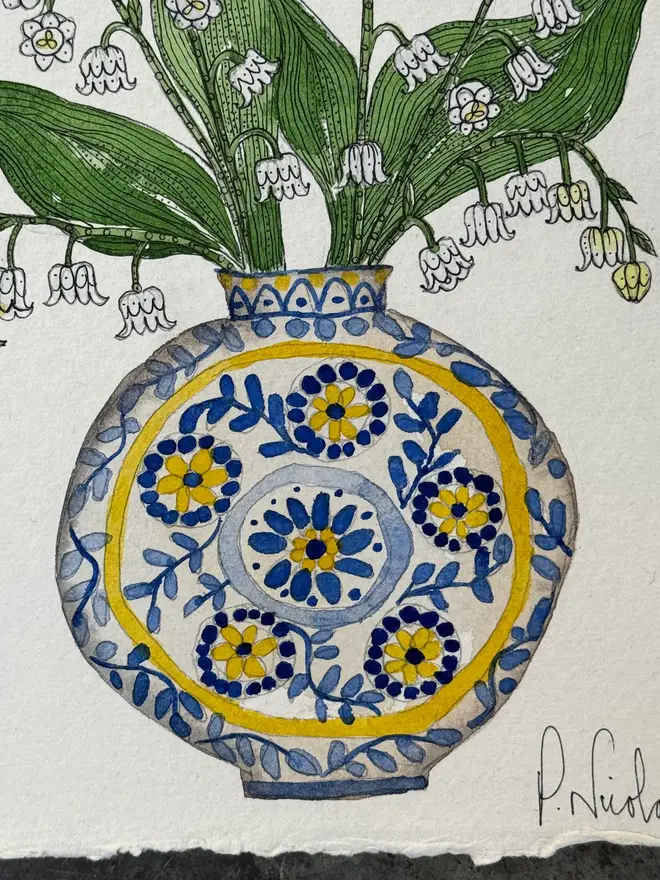 Lily of the Valley flowers in a Blue & Yellow vase