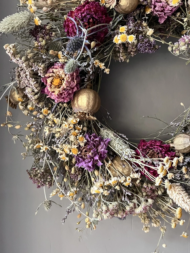 Autumnal dried flower wreath made with a range of seasonal flowers