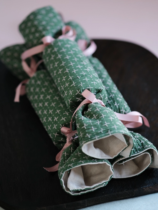 Self fill, reusable embroidered linen christmas cracker
