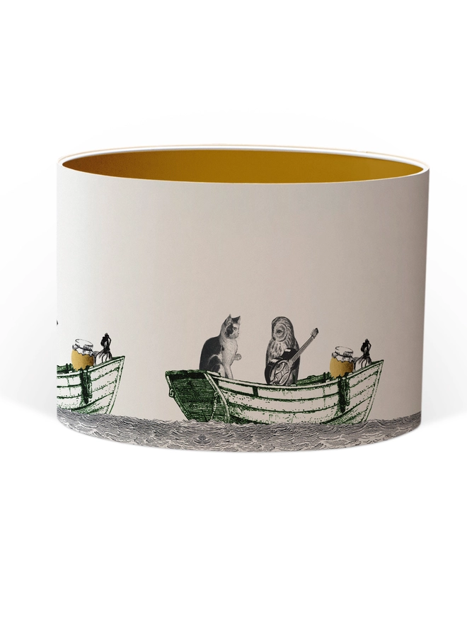 Handcrafted Owl and the Pussycat lampshade featuring a whimsical pea green boat illustration, bringing a touch of nostalgic storybook charm to the home.