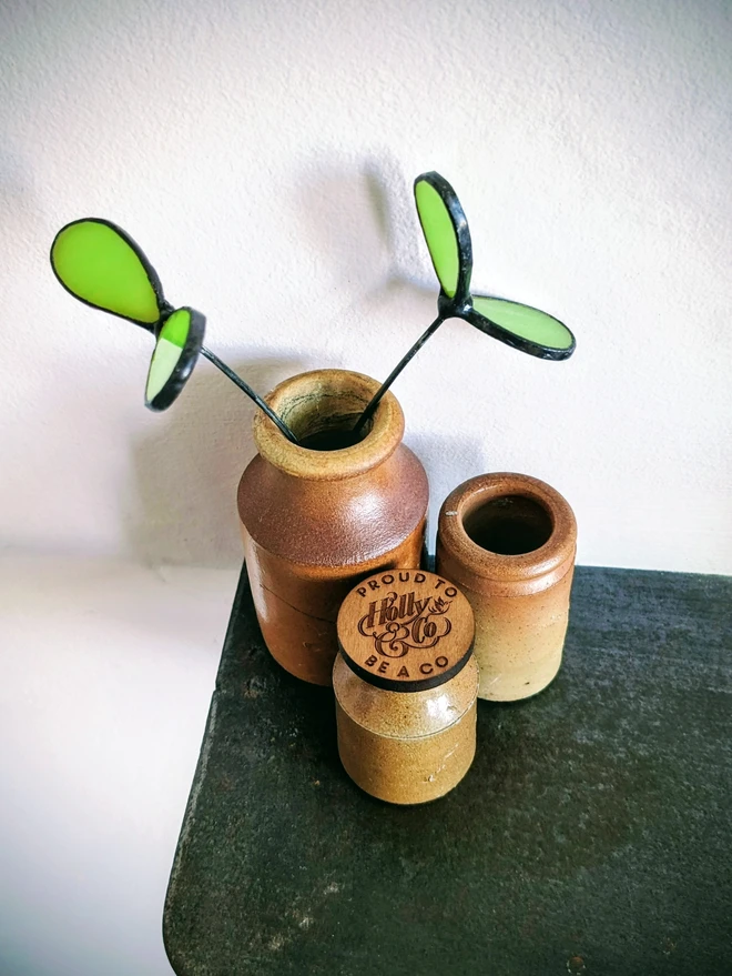 Two stained glass seedling stems